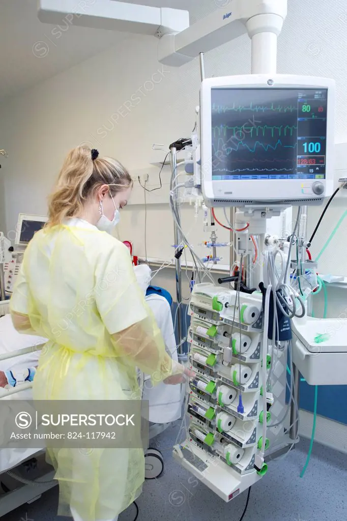 The cardiology intensive care department of Saint_Philibert hospital GHICL in Lille, France. A nurse dispensing care to a patient on a life_support ma...