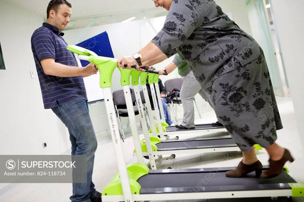 Reportage in the Obesity Clinic IPCO in Mulhouse, France. Physical exercise session with a masseur_physiotherapist. Patients must attend these session...