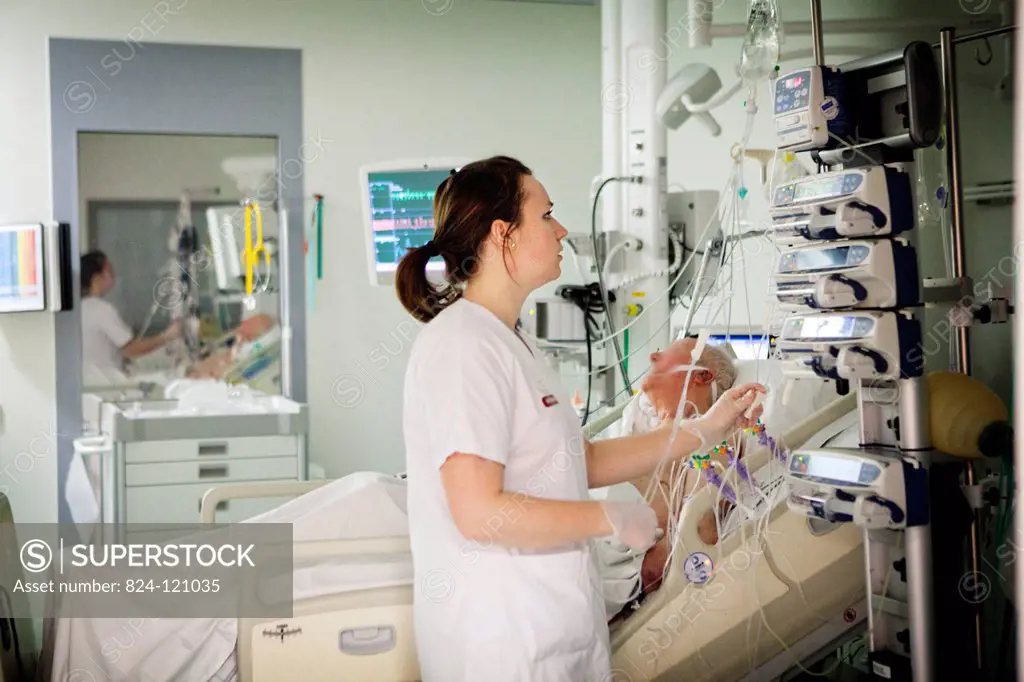 Reportage in Robert Ballanger hospital's Intensive Care Unit in France. A nurse checks the syringe pumps.