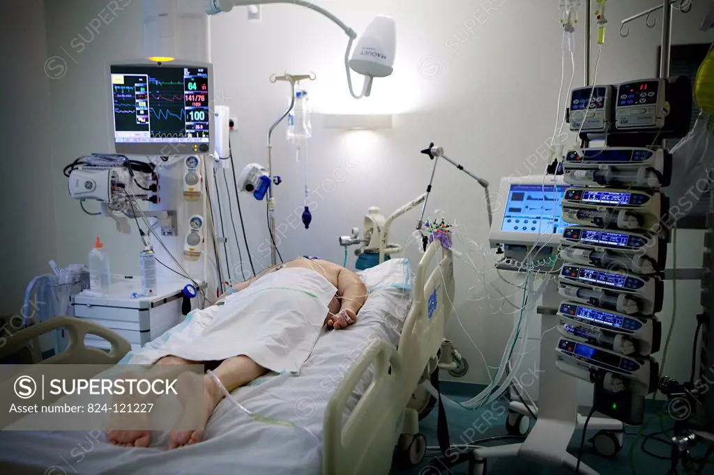 Reportage in Robert Ballanger hospital's Intensive Care Unit in France. A patient is placed on their stomach to help breathing.