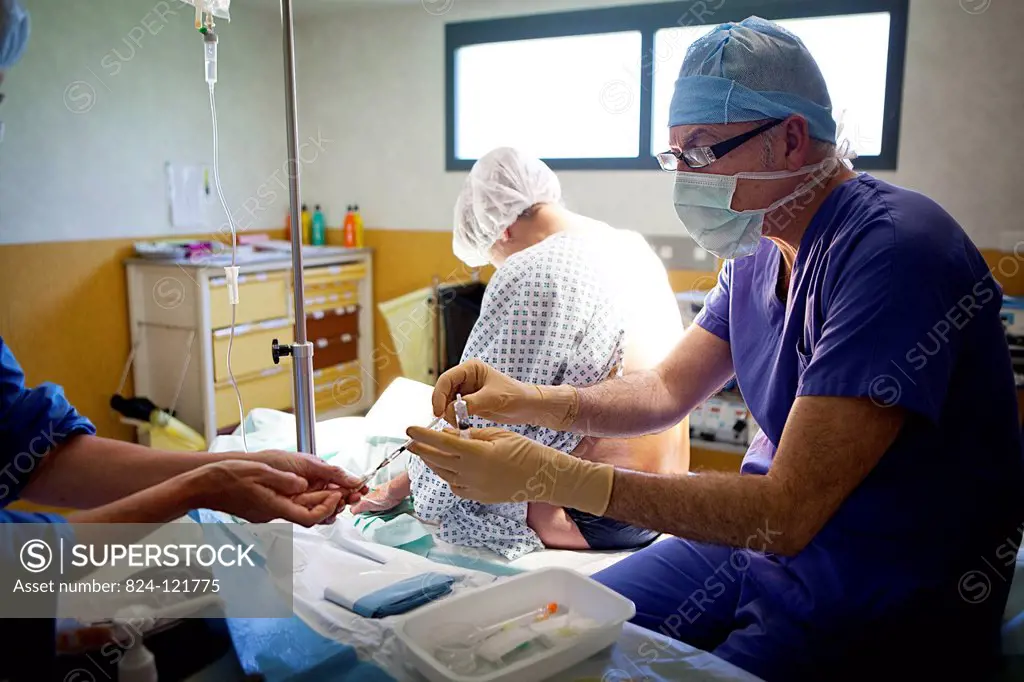 Reportage on a cesarean under hypnosis, in the maternity ward of Saint-Grégoire hospital in Rennes, France. The anaesthetist hypnotises the patient wh...