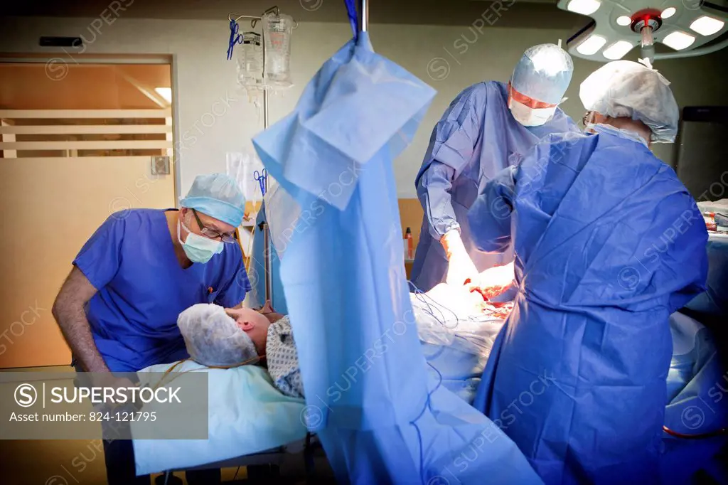 Reportage on a cesarean under hypnosis, in the maternity ward of Saint-Grégoire hospital in Rennes, France. The anaesthetist hypnotises the patient wh...