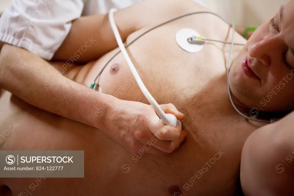 Reportage in the Les Grands Prés cardiac rehabilitation centre in Villeneuve Saint Denis, France. Echocardiogram with an ECG.