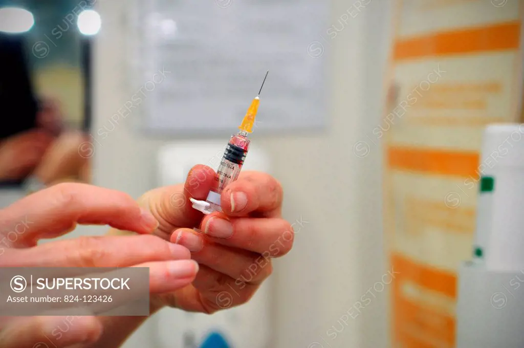 Reportage in the Health and Prevention Centre run by the local committee for social hygiene (CDHS) in Lyon, France. MMR vaccination. Priorix immunises...