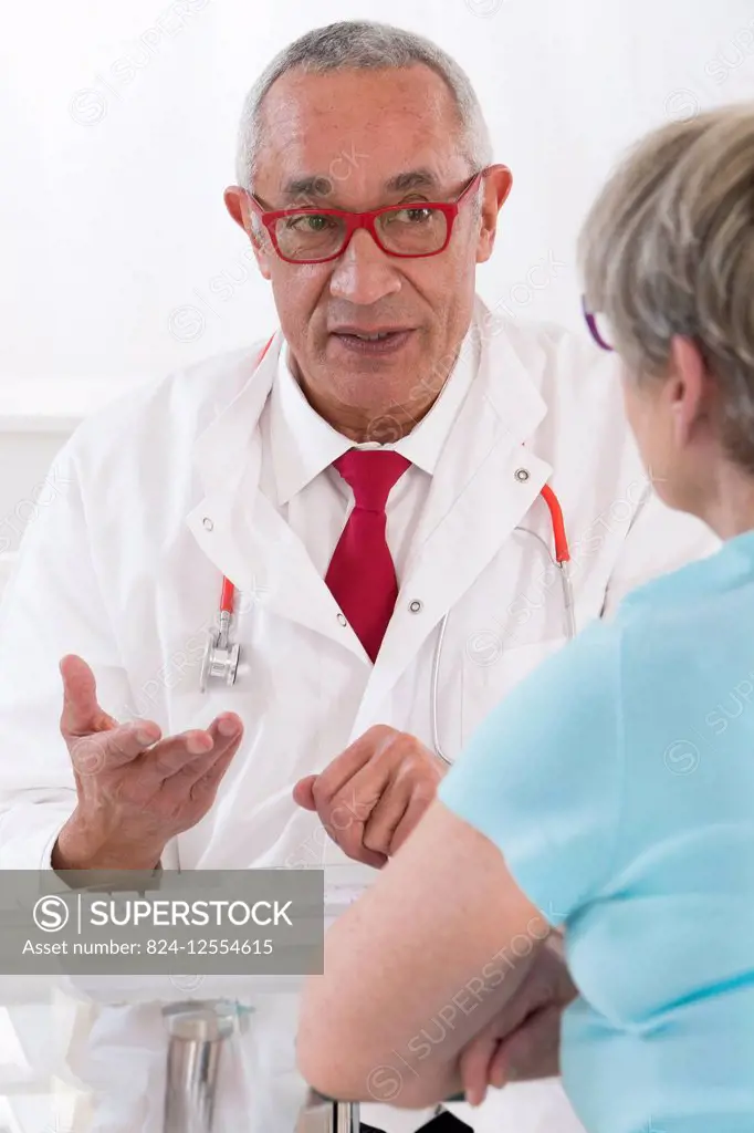 A patient chatting to her doctor.