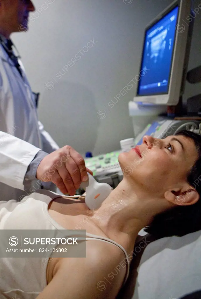 Digital medical imaging centre in Paris, France. Thyroid ultrasound scan.
