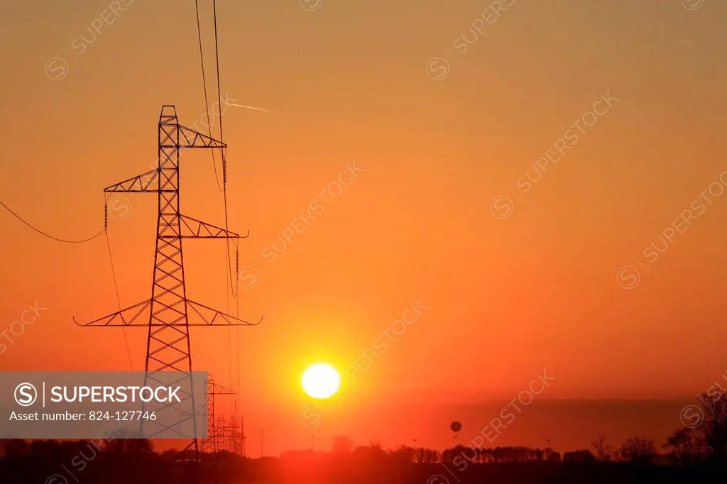 Electricity pylons sunset.