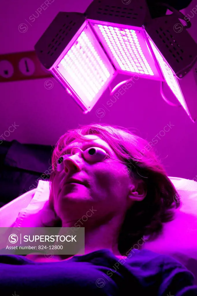 Photo essay in a aesthetic medicine office France. Spectrum LED cold light skin therapy is a non_invasive procedure activating skin cells with low_lev...