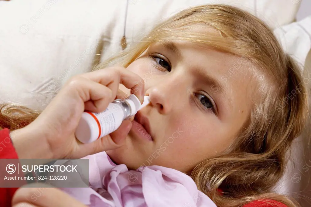 Child using nose spray