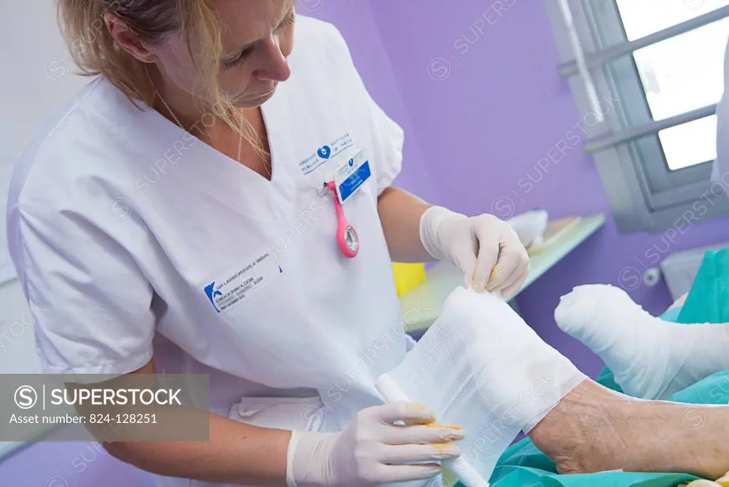 Reportage in the Endocrinology service of Lariboisière hospital in Paris, France. A diabetic's foot dressing.