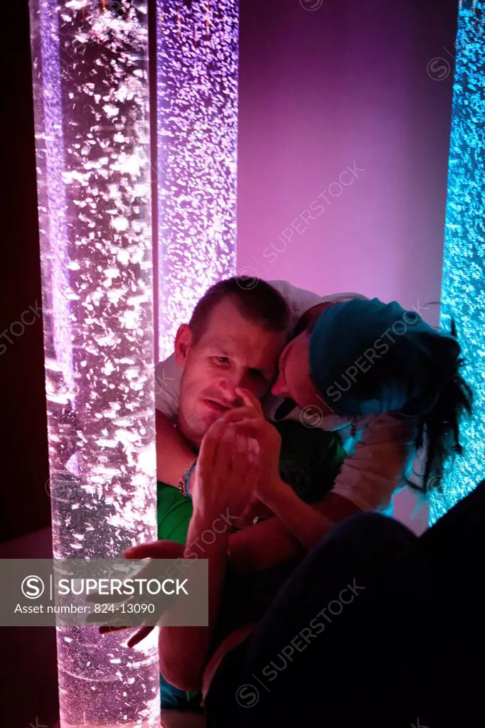 Reportage in a snoezelen room in a residency that houses adult autists in Liège. Rémy, 40, moves around in this multi_sensory environment, which is bo...