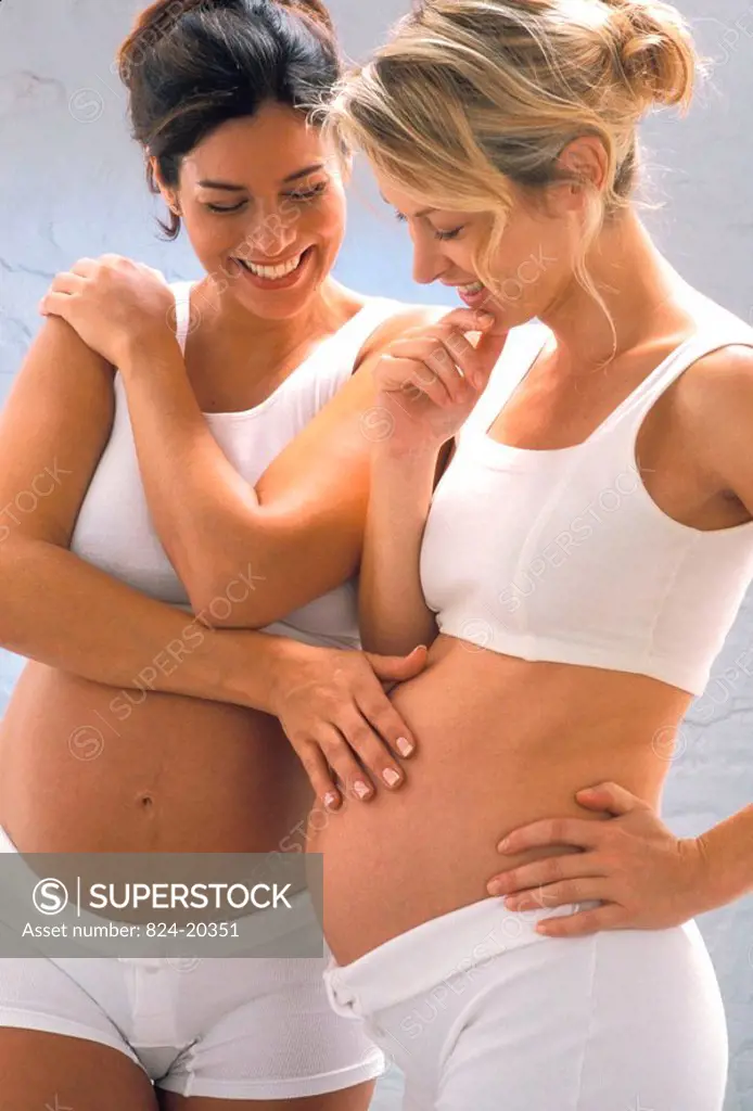 PREGNANT WOMAN INDOORS<BR>Models.