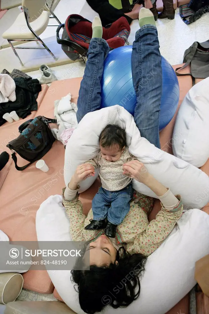 Photo essay at the maternity of Rouen hospital in France. Postnatal gymnastics.