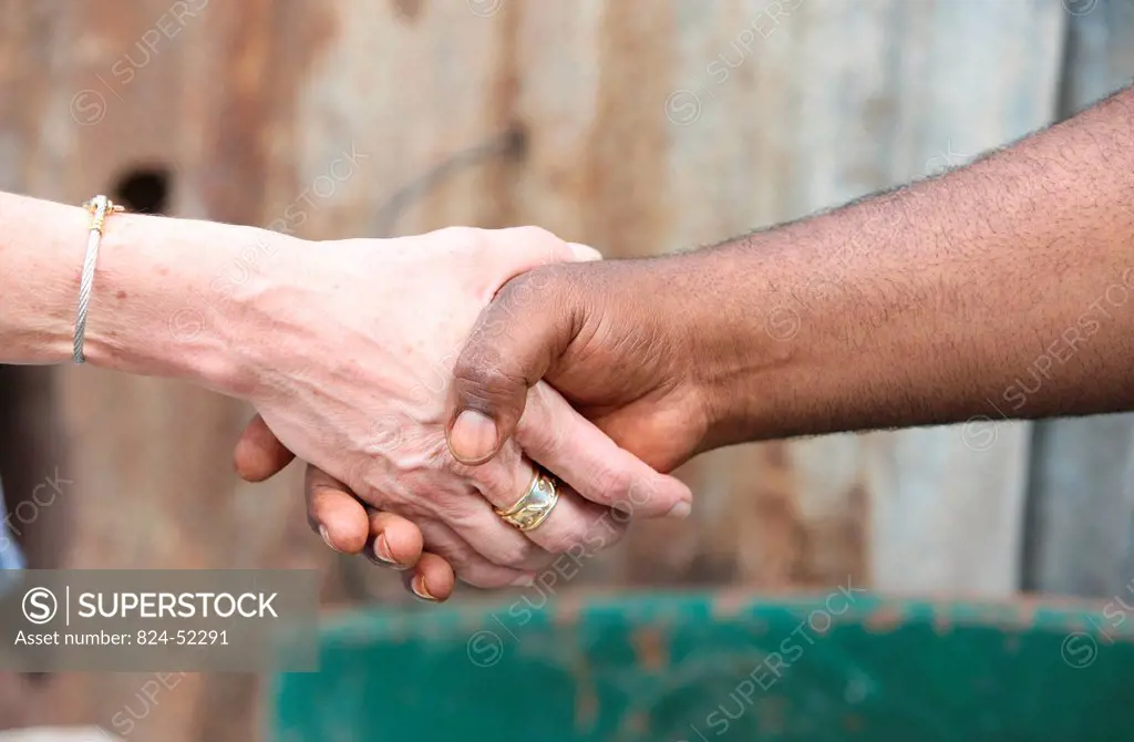 Multiracial handshake.