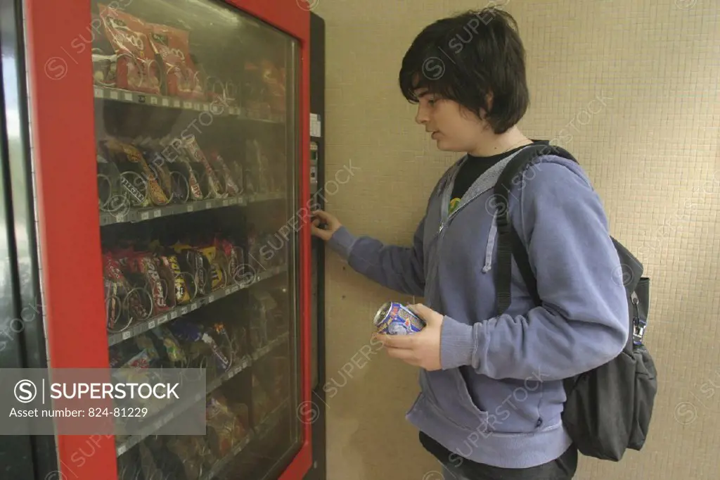 ADOLESCENT SNACKING<BR>Model.<BR>Candy vending machine.