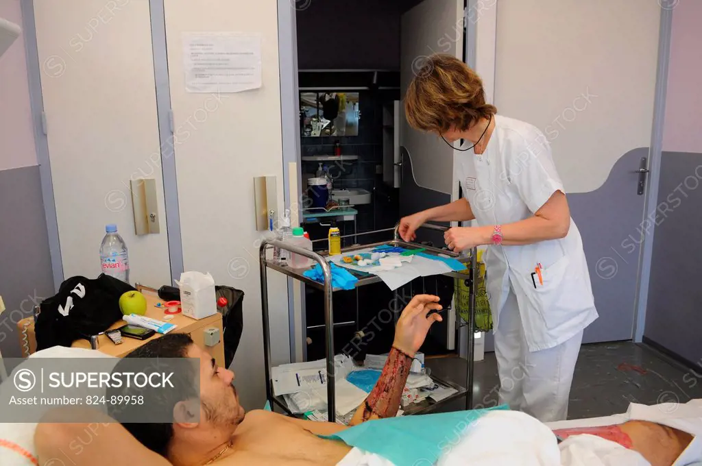 Photo essay at Henry Gabrielle hospital in Lyon, France. Department of urology. Postoperative nursing care of trans man patient after a sex reassignme...