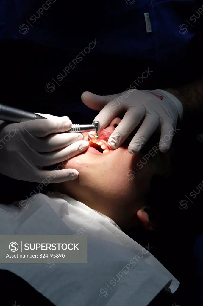 Teenager receiving dental care.