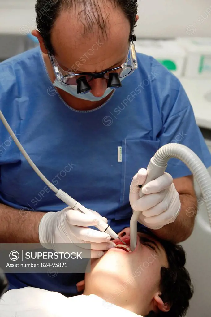 Teenager receiving dental care.