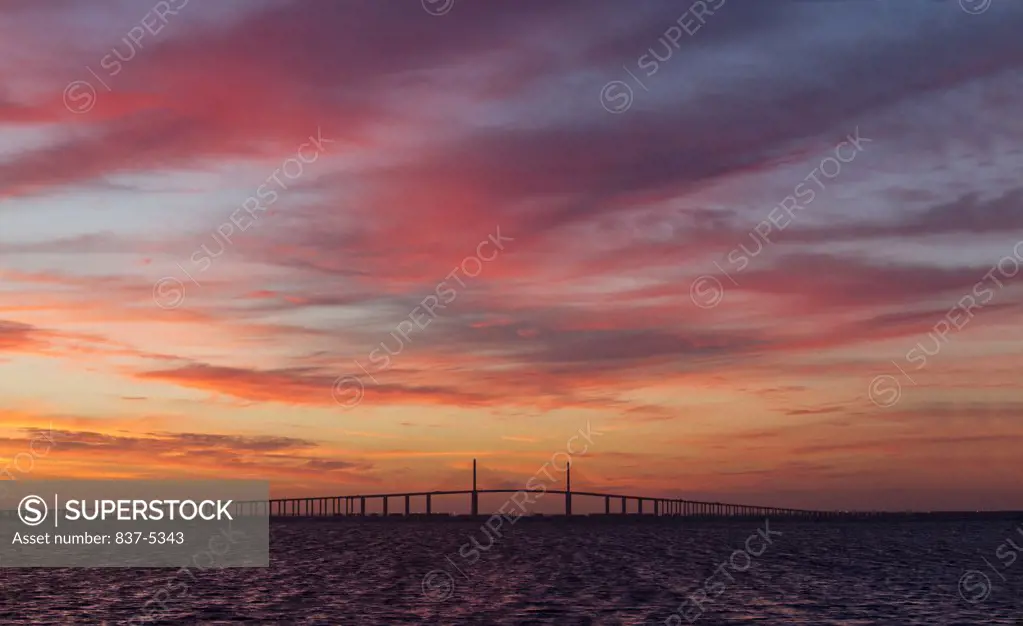 Silhouette of a bridge at sunrise, Sunshine Skyway Bridge, Tampa Bay, Florida, USA