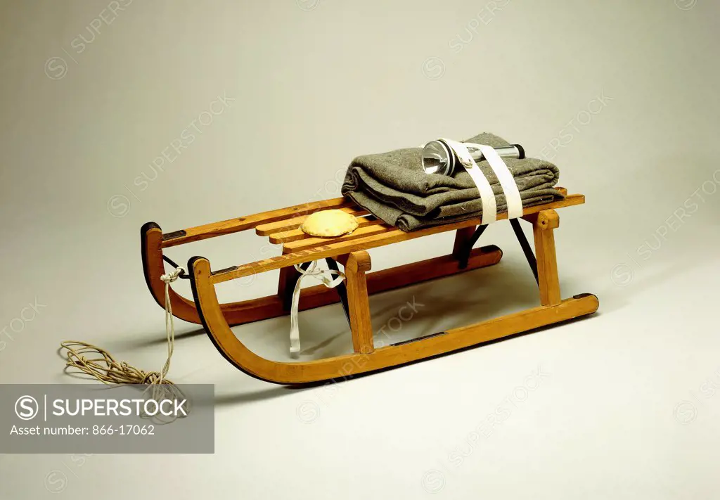 Sled No.2. Joseph Beuys (1921-1986). Wood, felt, fat, painted steel, cotton cord, cotton straps and flashlight. 40.6 x 90.2 x 35.5cm.
