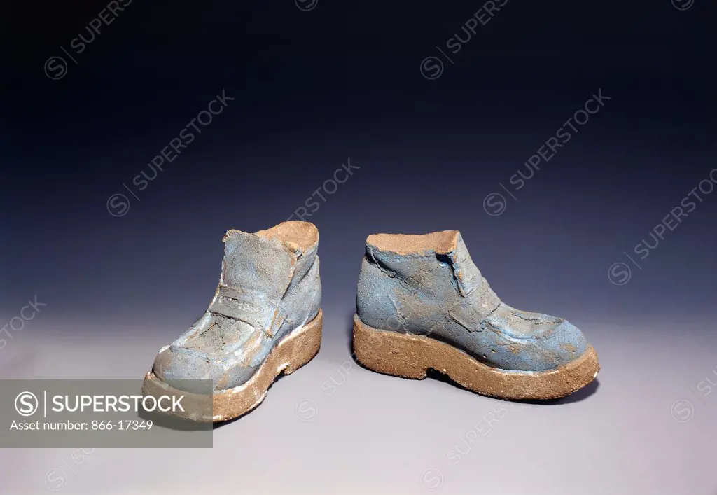 Boots. Sarah Lucas (b.1962). Painted concrete. Executed in 1996. 15.5 x 11.5 x 26.7cm.