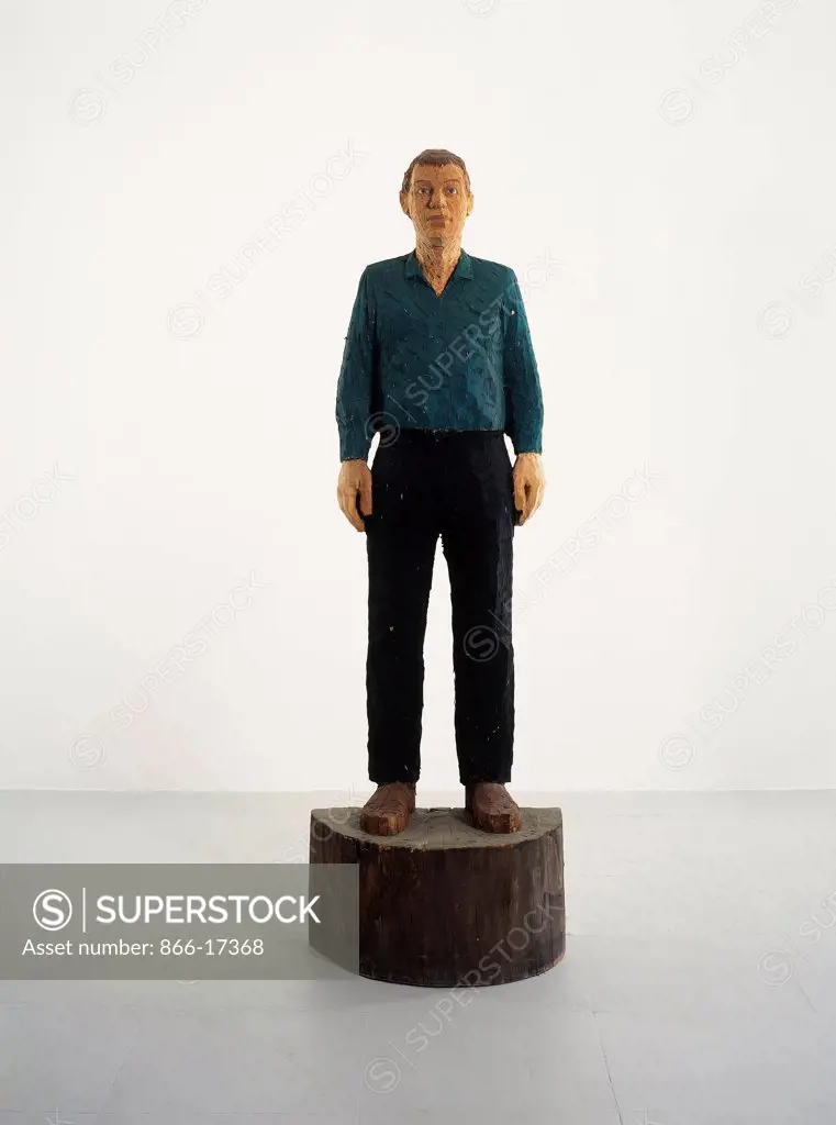 Man with Green Shirt. Stephen Balkenhol (b.1957). Whitewood and paint. Executed in 1988. 250.2cm high.
