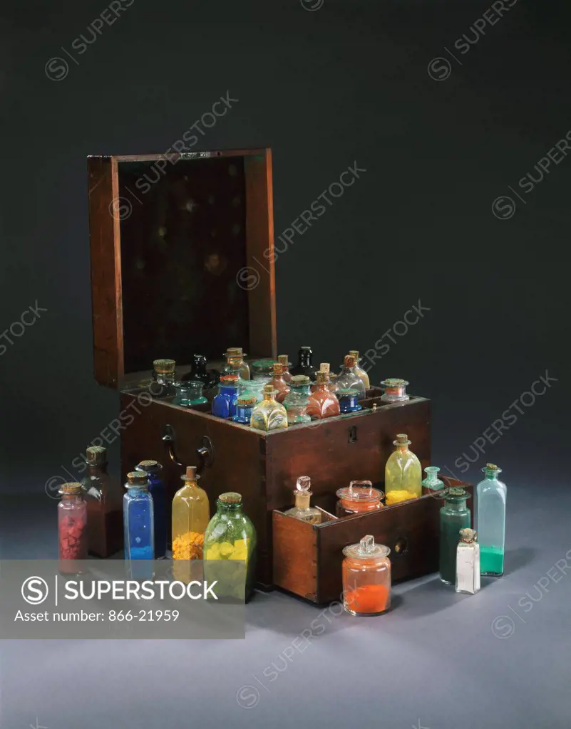 A mahogany artist's colour box, reputedly owned by John Adams of HMS Bounty, containing glass bottles of coloured pigment. 28.4 x 30.4 x 34.9cm.