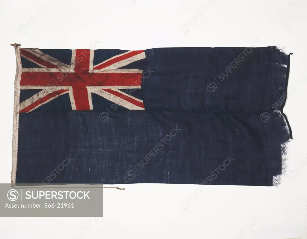A Blue Ensign British flag, the outer edge slightly tattered. Flown on the HMS Nimrod on Sir Ernest Shackleton's British Antartic Expedition 1907-09. 88.4 x 163cm