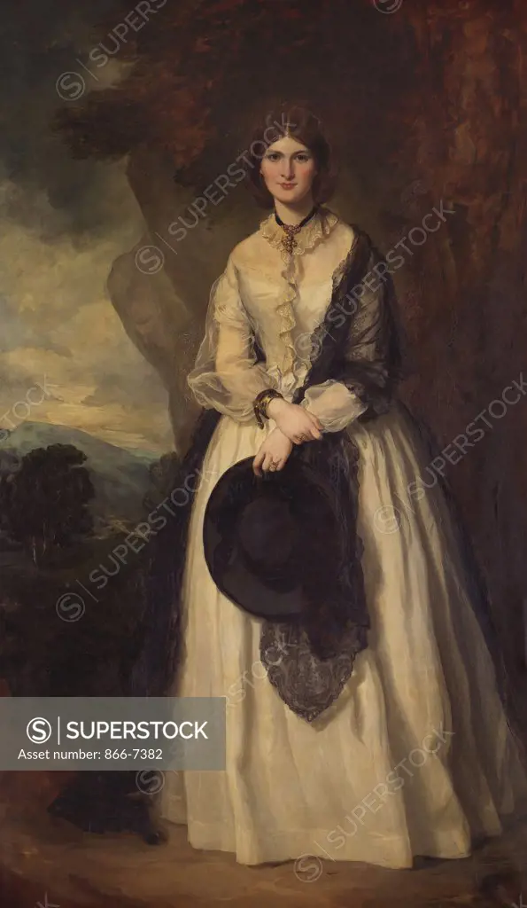 Portrait of a Lady standing full length, Wearing a White Dress, a Black Shawl and Holding a Black Hat in a Landscape. Sir Francis Grant, P.R.A. (1803-1878). Oil on canvas.