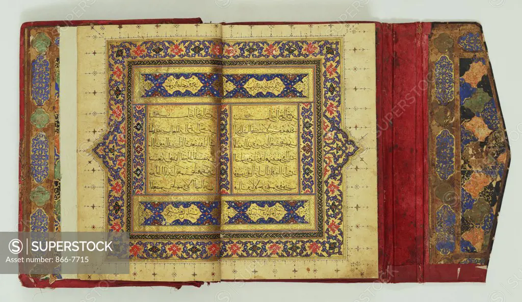 Qur'an. Persia, 16th century. Manuscript, the decorated panels to each side with gold floral designs, gold discs between verses, outer coloured margins, with text on gold ground. Text: 21.6cm., folio: 33 x 23.5cm.