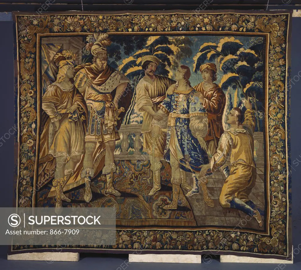 An Aubusson tapestry, woven in wools and silks, with a Prince held by two men, pleading before a General in Roman armour and a Courtier. 17th century, 316cm x 364cm.