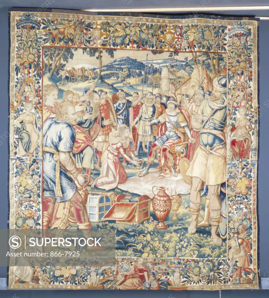 A Bruges tapestry, woven in wools and silks, depicting Alexander the Great shown seated in Armour on his Throne, being Presented with Keys by the Daughter of Darius. Franz Greubels (fl. 1540-1590). Late 16th century, 283 x 264cm.