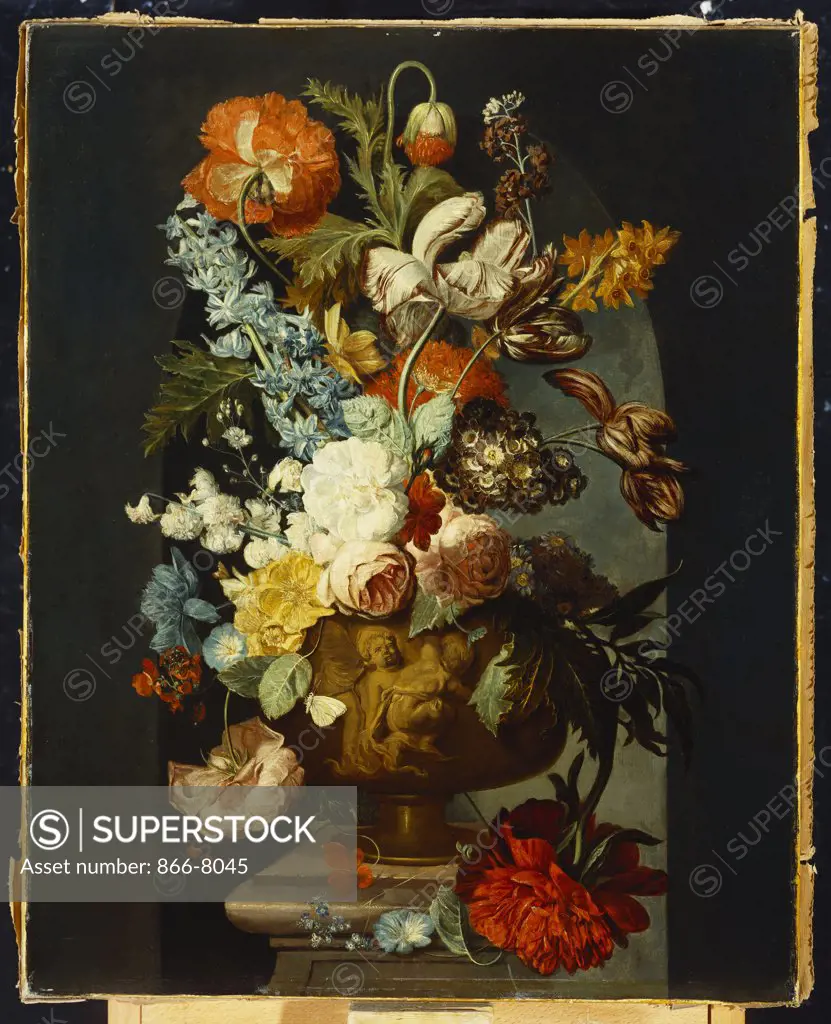 Tulips, Roses, Hyacinth, Auricula and other Flowers in a Sculpted Urn on a Stone Pedestal in a Niche. Follower of Jan van Huysum (1682-1749). Oil on canvas, 73.7 x 59cm.