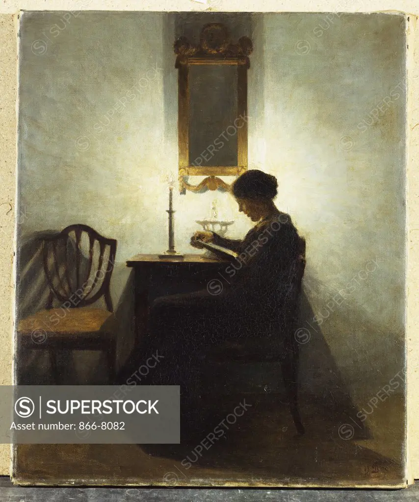 A Woman Reading by Candlelight in an Interior. Peter Ilsted (1861-1933). Dated 1908, oil on canvas, 47 x 38.5cm.