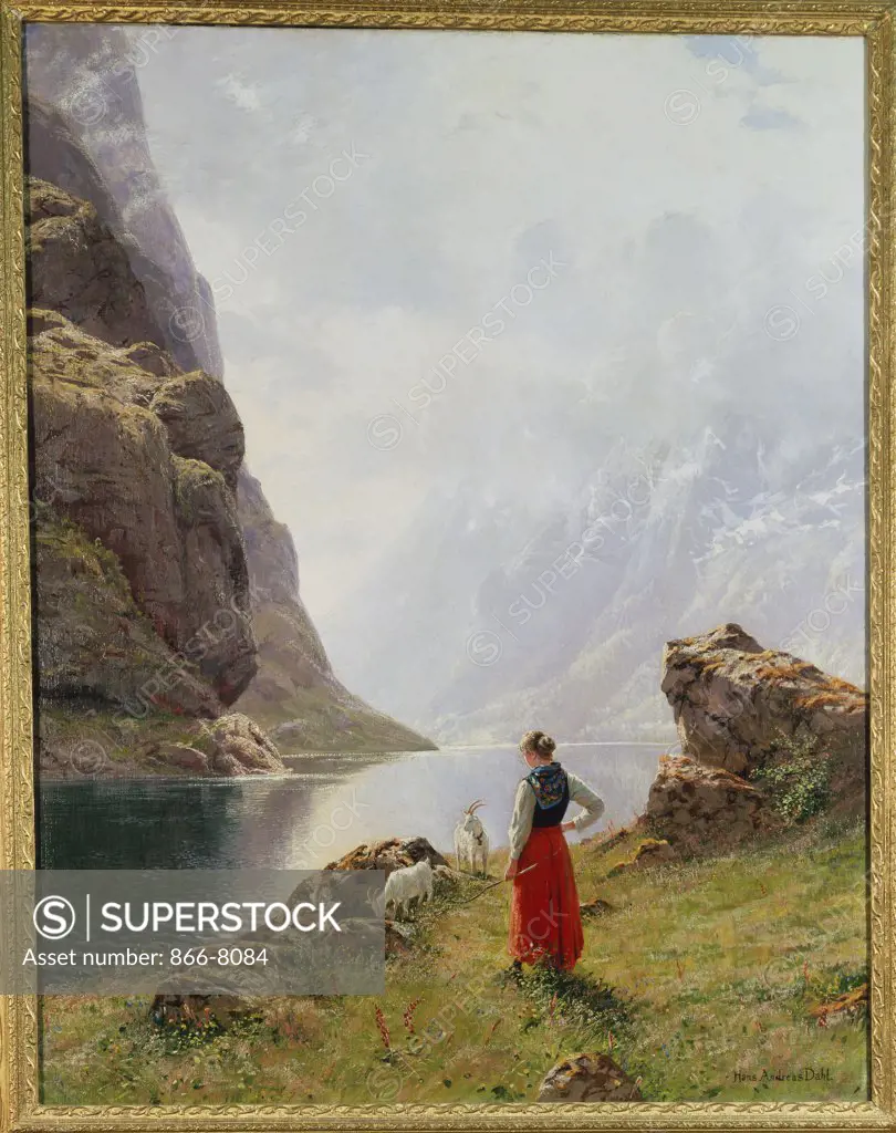 A Girl with Goats by a Fjord. Hans Dahl (1849-1937). Oil on canvas, 128.3 x 100.4cm.