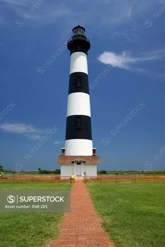 Path in front of a lighthouse, Bodie Island Lighthouse, Cape Hatteras National Seashore, North Carolina, USA
