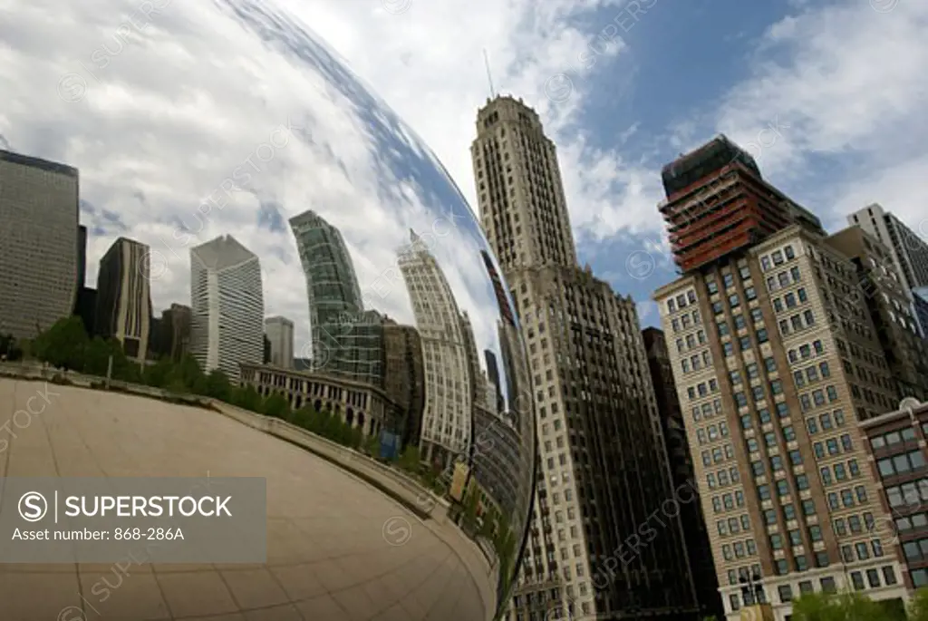 Buildings reflected in a sculpture, Cloud Gate, Millennium Park, Chicago, Illinois, USA