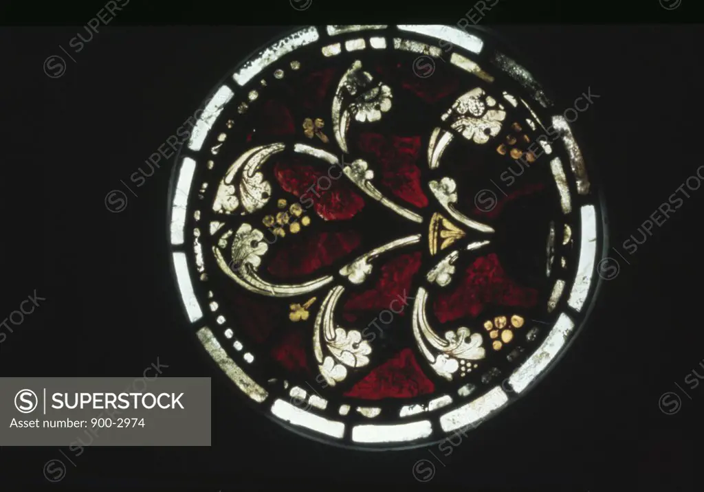 UK,  England,  Salisbury,  Salisbury Cathedral,  Stained glass with roundel of foliage and berries