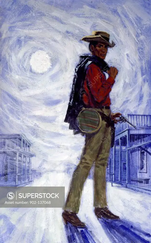 Portrait of cowboy holding pistol in town