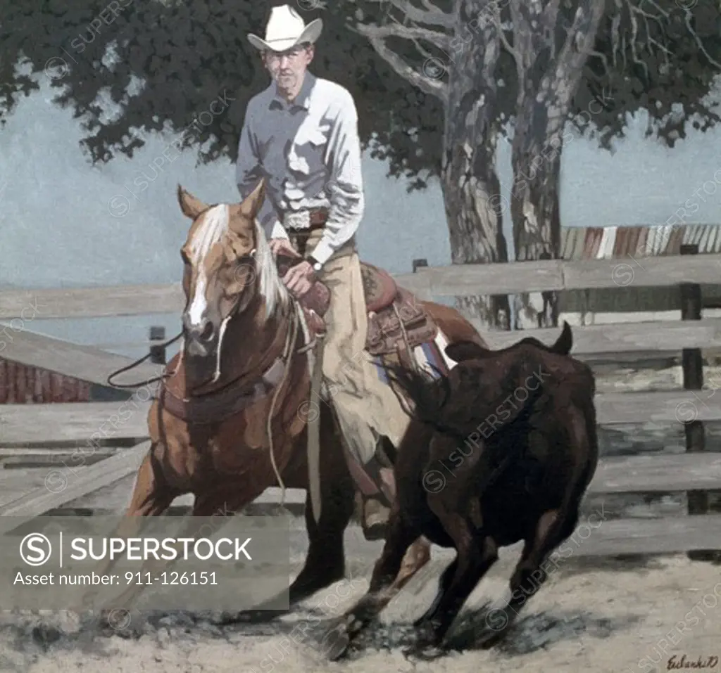 Cowboy riding a horse in a ranch
