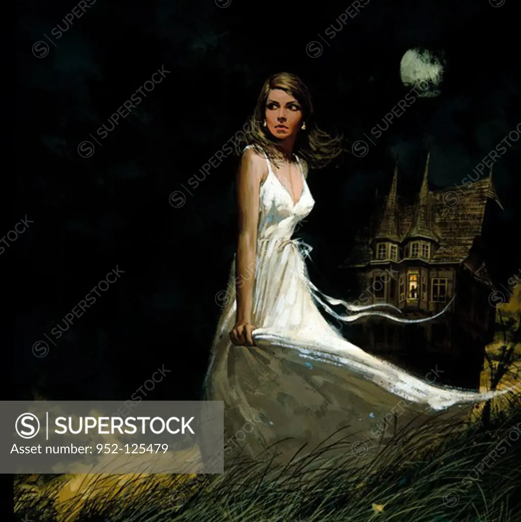 Woman in a field with a castle in the background