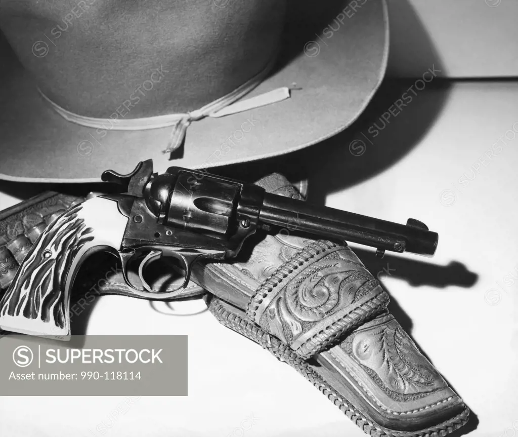 Close-up of a .38 Caliber Bisley Special Colt Revolver and a hat