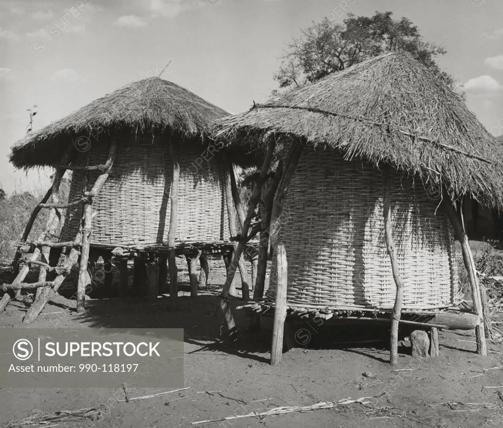 Grain storage bins in a field, Malawi