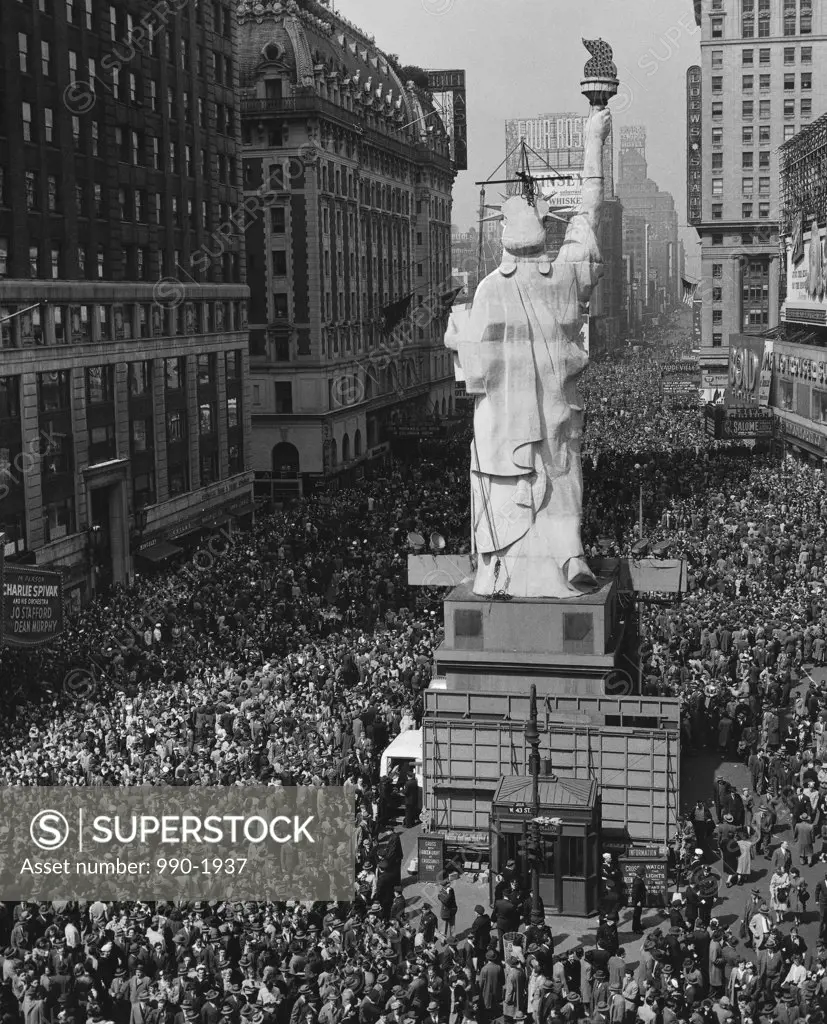 High angle view of crowd around a statue, VE Day, New York City, New York, USA
