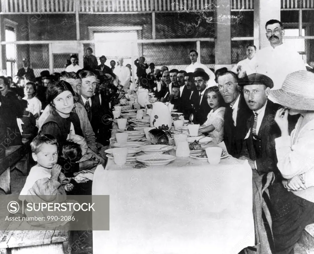 Immigrants at a dining table, Ellis Island, New York City, New York, USA