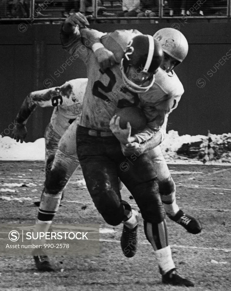 Dave Ames being tackled by Bill Atkins Denver Broncos vs. Buffalo Bills November 19, 1961