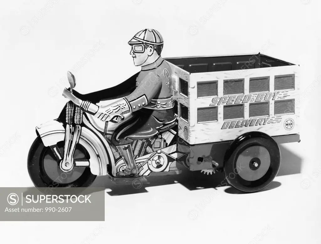 Side profile of a male figurine driving a Mechanical Delivery Motorcycle, 1930