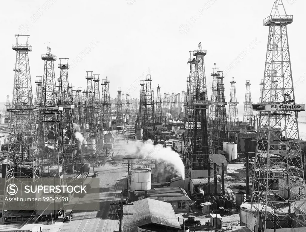 Oil drilling rigs in an oil refinery, California, USA