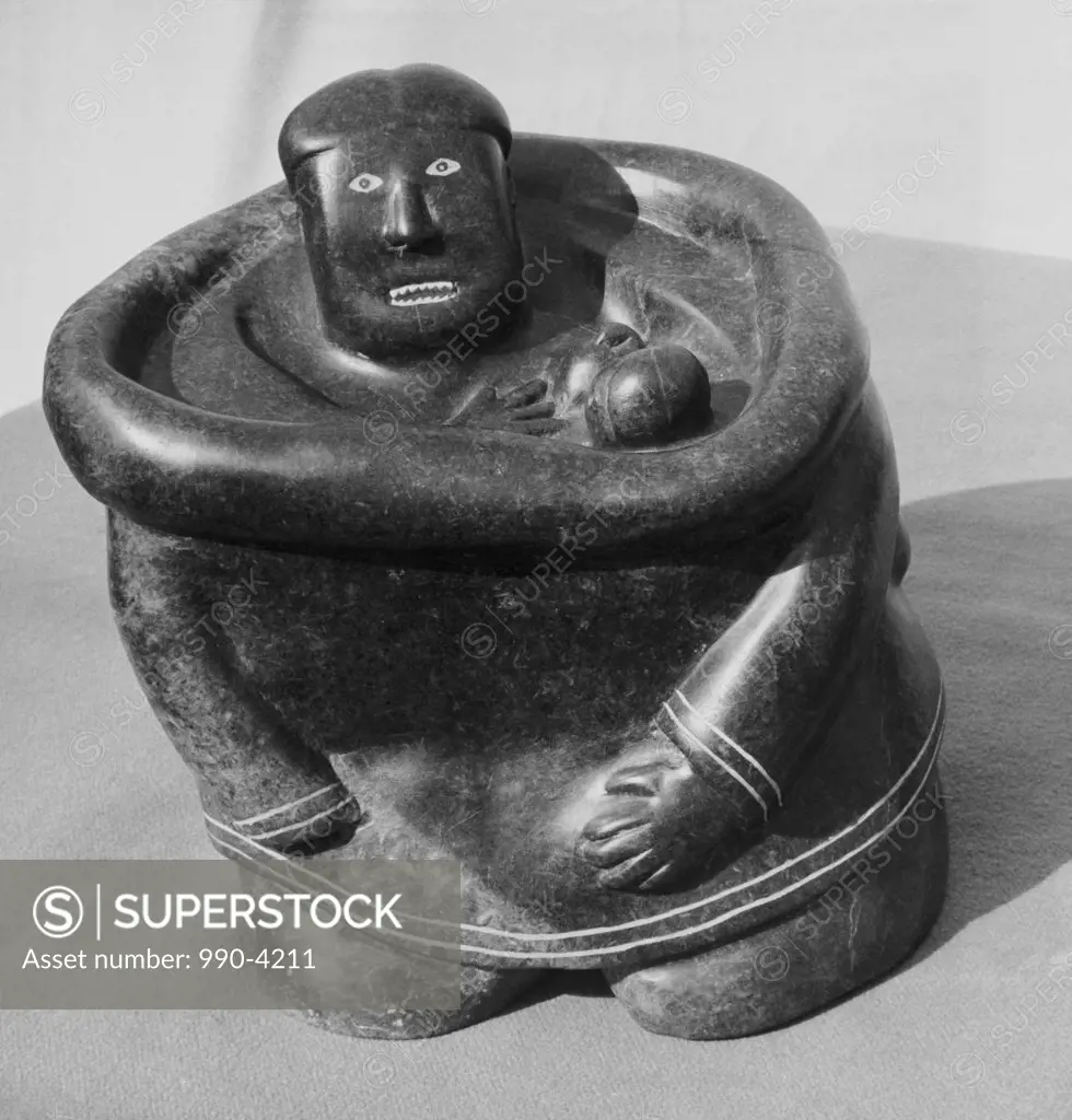 Eskimo Carving of a Nursing Mother Artist Unknown Soapstone