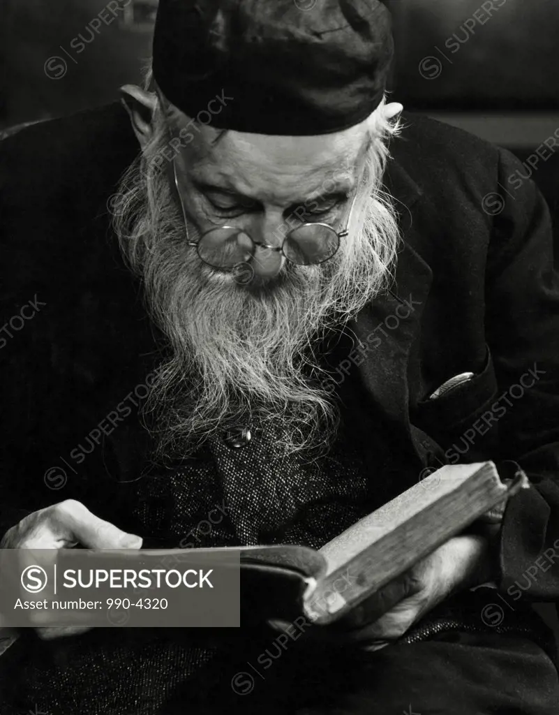 Close-up of a rabbi reading the Talmud